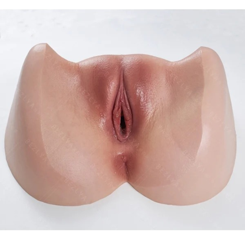 Realistic silicone male masturbator with detailed labia and natural skin texture