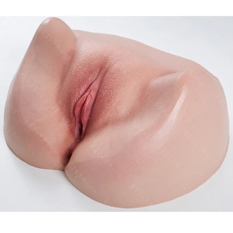 Realistic flesh-toned male masturbator with detailed labia and textured inner canal for enhanced pleasure