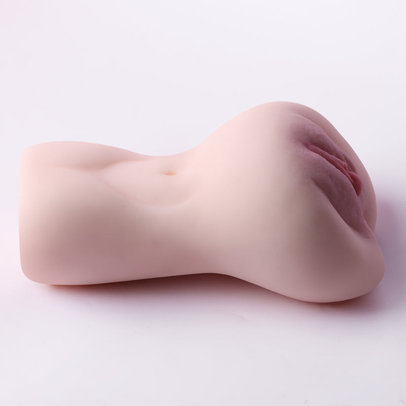 Realistic flesh-toned male masturbator with detailed vaginal opening and smooth silicone texture