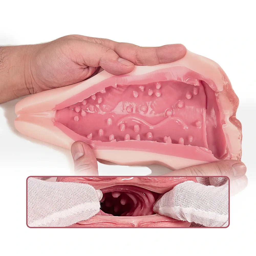 Realistic pink silicone male masturbator with textured interior and ribbed tunnel for enhanced stimulation