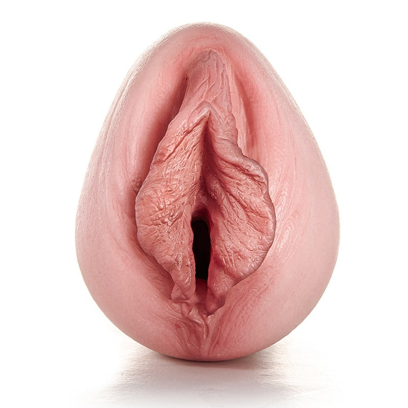Realistic pink male masturbator with detailed labia and textured interior for enhanced pleasure