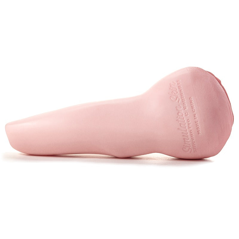 Pink silicone male masturbator with realistic texture and ergonomic shape, labeled Simulation Gem