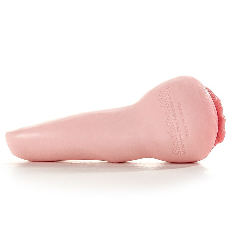 Pink silicone male masturbator with realistic vaginal opening and textured interior, labeled Simulation Skin