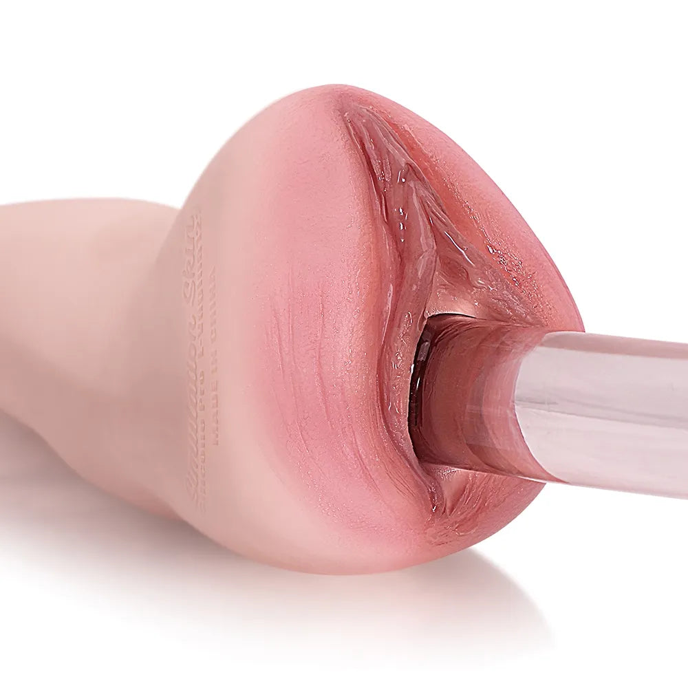 Realistic pink silicone male masturbator with textured inner canal and smooth exterior